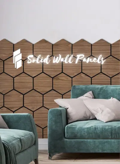 Living room with green sofas and a geometric wooden wall panel, featuring 'Solid Wall Panels' branding.